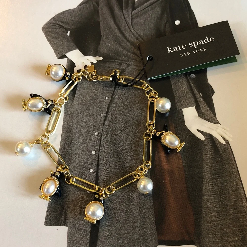 Authentic kate spade NWT Gold Charm Bracelet with Pearls and Black Penguins